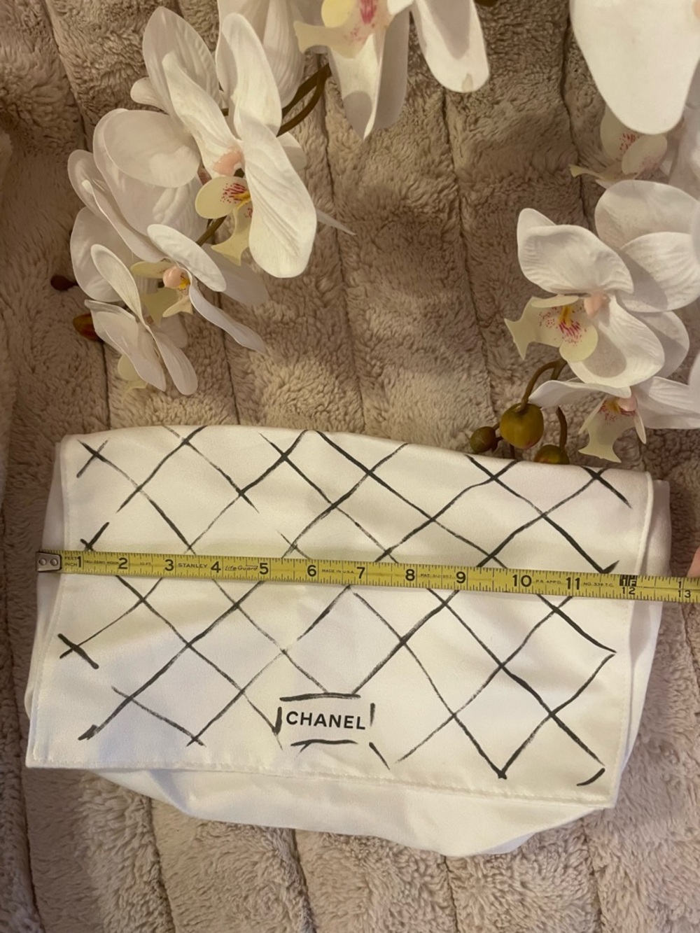 CHANEL White Cosmetic Pouch with Black Diamond Sketch Pattern